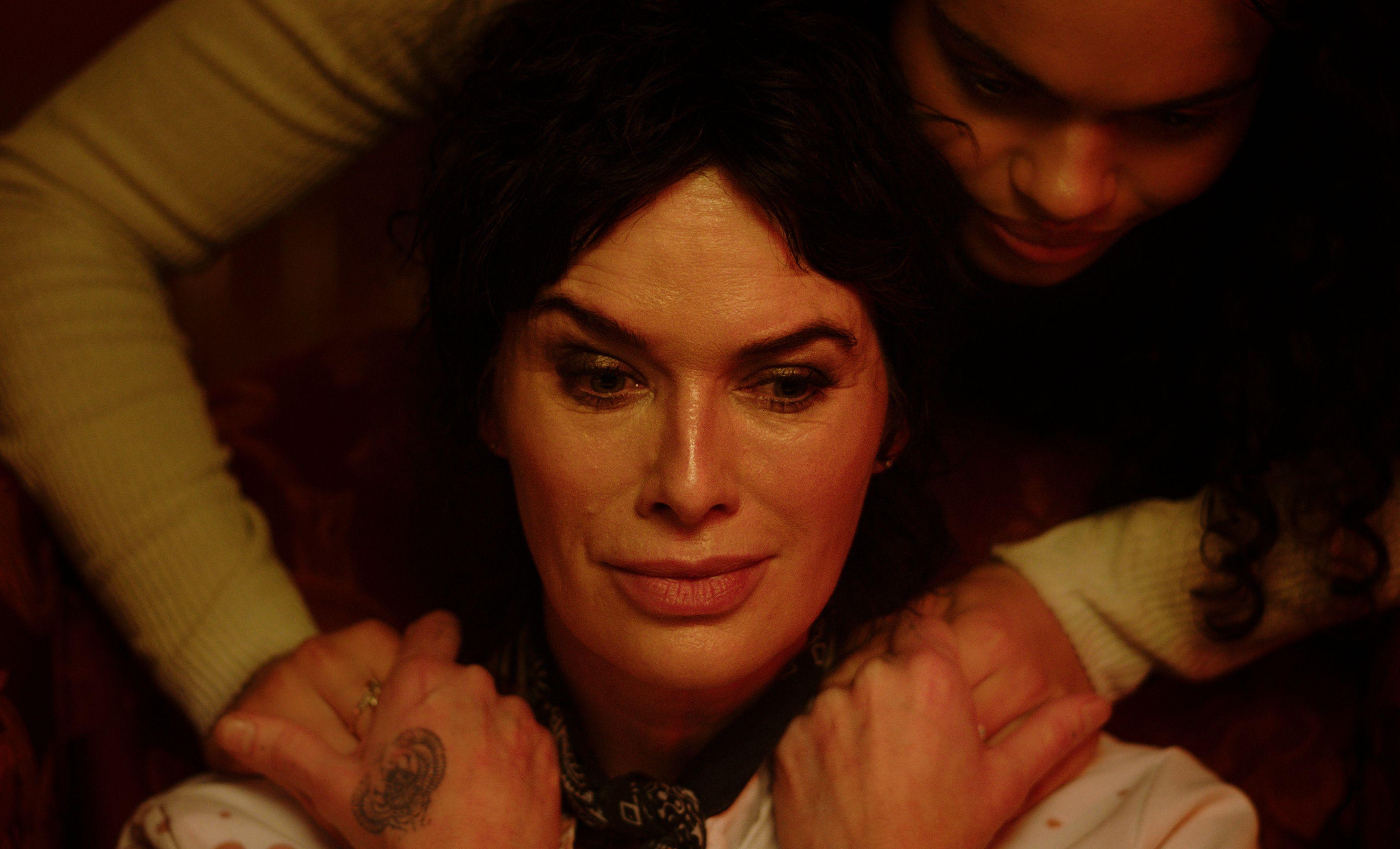 Still from "Long Pork" depicting actor Lena Headey looking into the camera