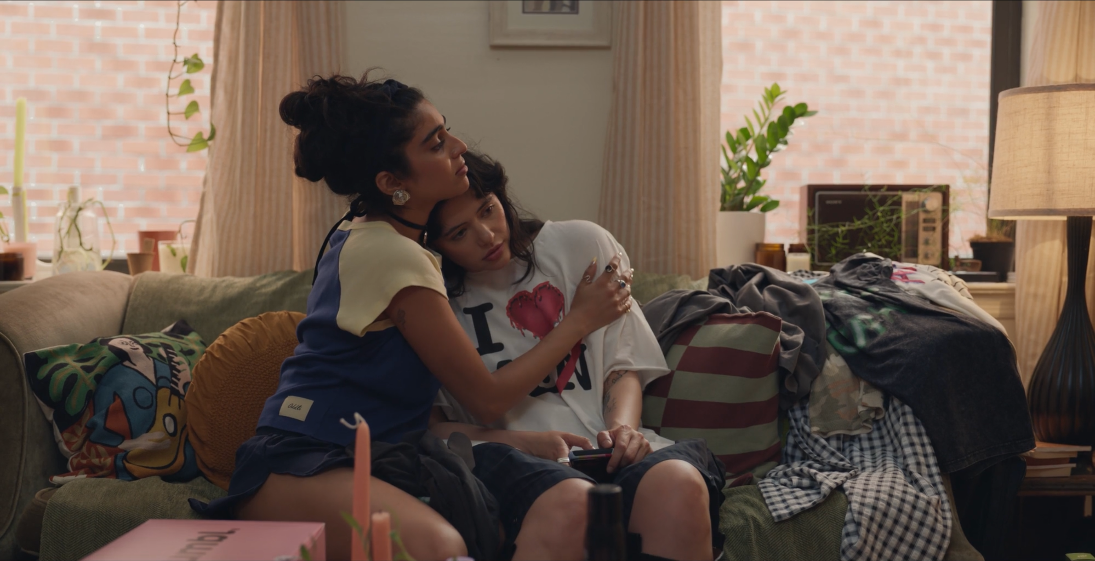 Still from "Too Romantic" depicting one woman comforting her friend.